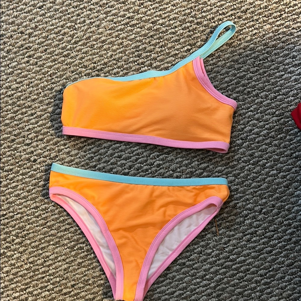 New bikini.  The bottom are large and the top is medium